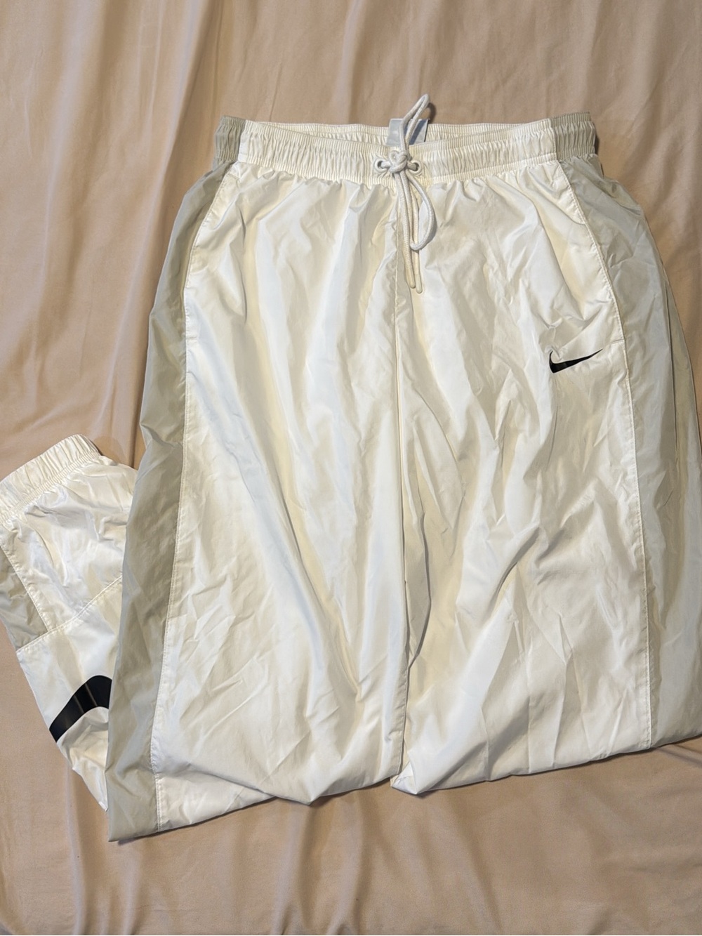 Nike White Track Pants with Black Swoosh and Light Gray Side Panels